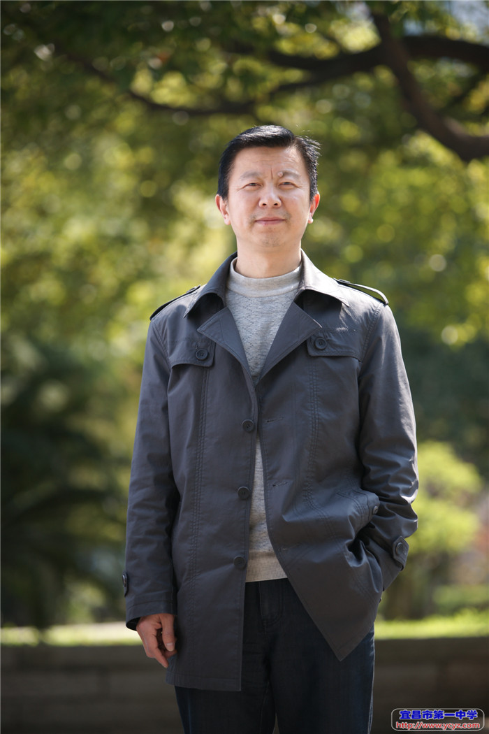 李明富,中高教师,国家优秀教师.